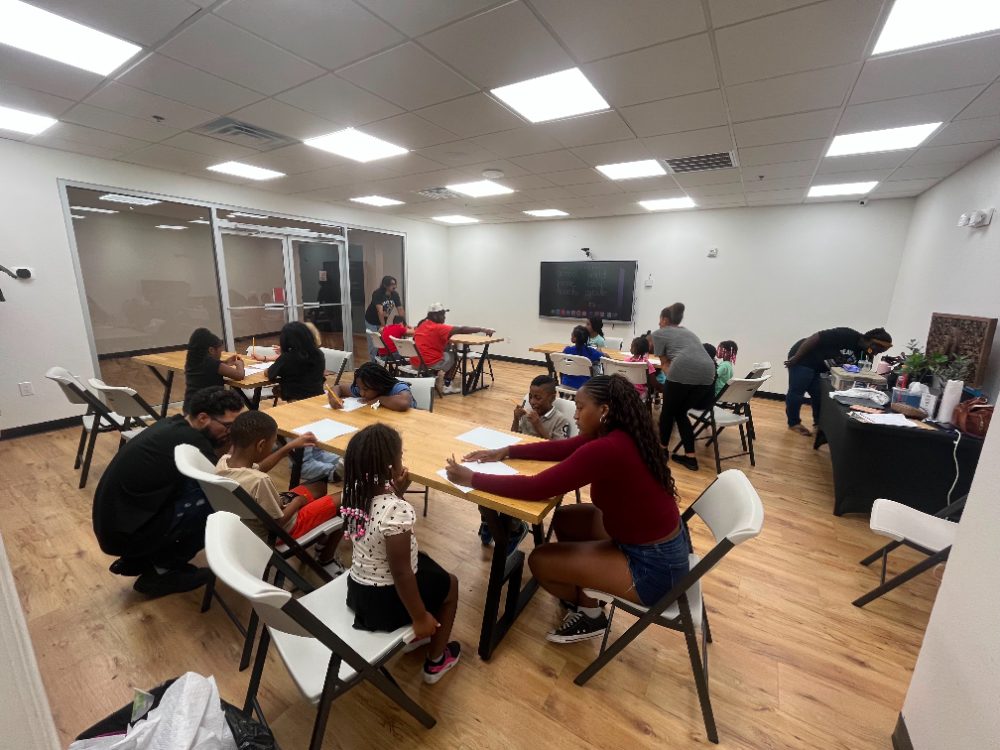 Students working with a tutor in a Blackmon Tutoring classroom